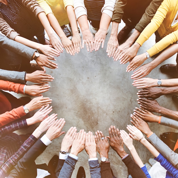 Aerial view of supported hands out together