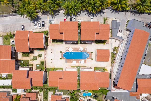 Aerial view of swimming pool and roofs