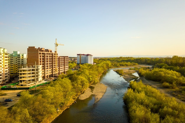 Aerial view of tall residential apartment buildings under construction