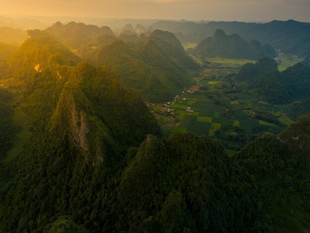 Aerial view of Thung mountain in Tra Linh Cao Bang province Vietnam with lake cloudy nature Travel and landscape concept