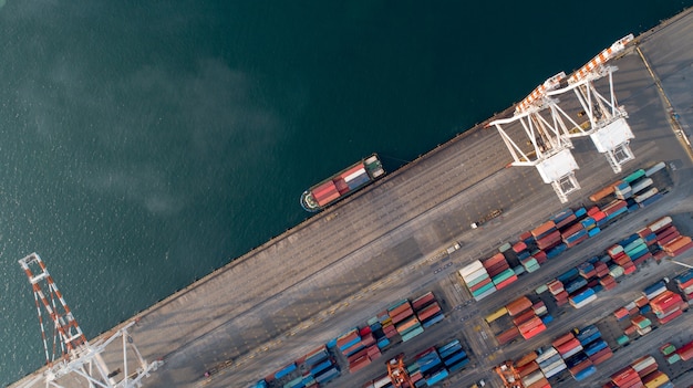 Aerial view or top view of cargo ship, cargo container in warehouse harbor 