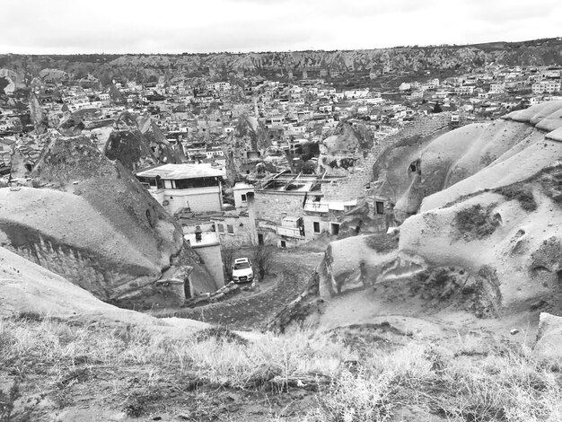 Aerial view of town against sky