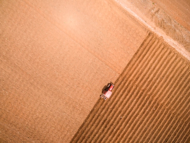 Aerial view of tractor on Prepare a field