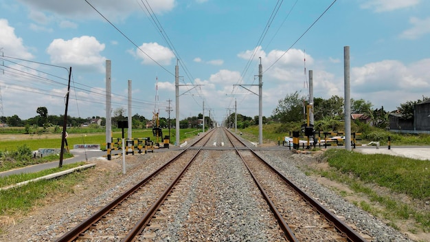 Aerial View of Train Rail with new electronic pole for KRL train in Yogyakarta Indonesia