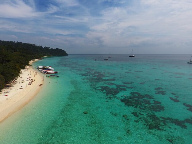 Aerial view of tropical beach corals and sea