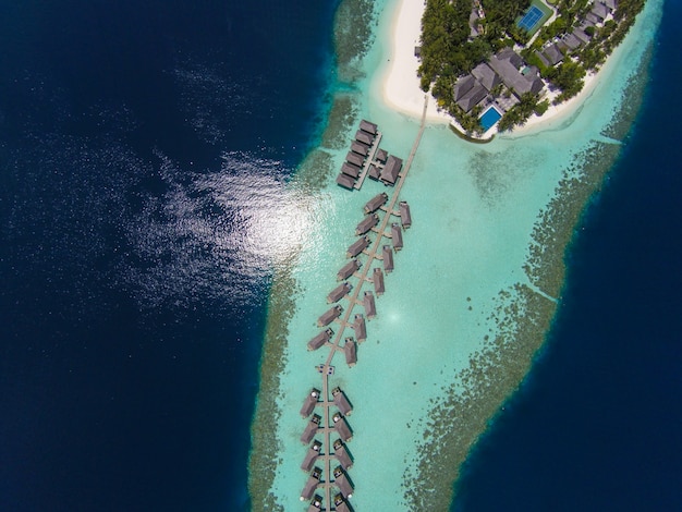 Aerial view of a tropical island in turquoise water