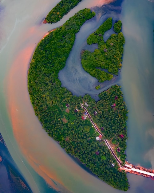 Aerial view of a tropical island with a bridge in the middle