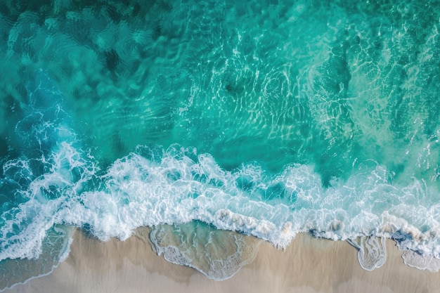 Aerial view of turquoise ocean water with splashes and foam