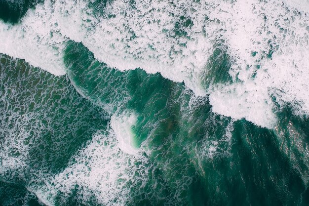 Photo aerial view waves in sea