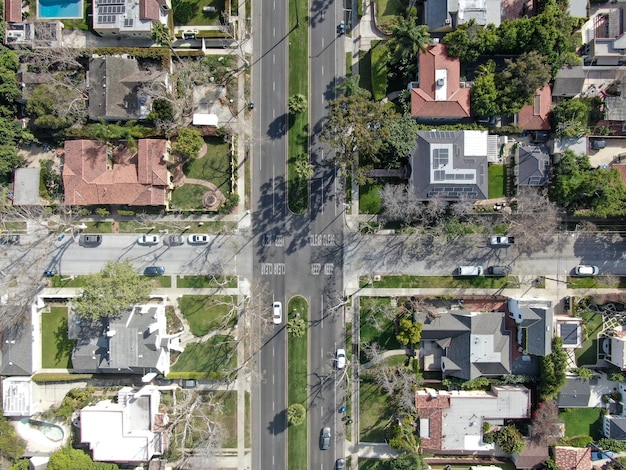 Aerial view of wealthy area with big houses and small street in Central Los Angeles California