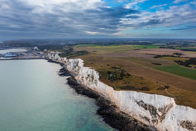 Aerial view of the white cliffs of dover close up view of the cliffs from the sea side