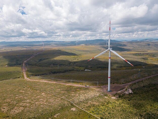 aerial view of wind power generators in Mexico's green landscape