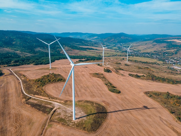 Aerial view of wind turbine electricity plant green energy