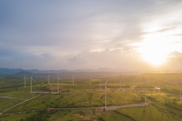 Aerial view of Wind turbines on sunny morning 