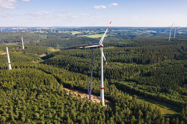 Aerial view of wind turbines or a wind farm under construction