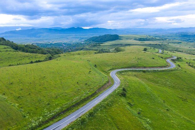 Aerial view of a winding country road winding