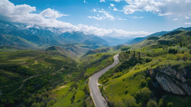 Aerial view of winding road through mountainous landscape