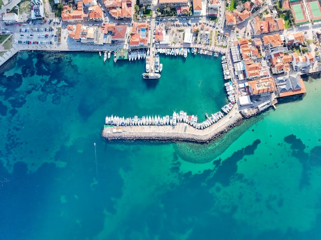 Aerial view with drone of the seaside town Urla Cesmealti in Izmir, Turkey. Iskele port.