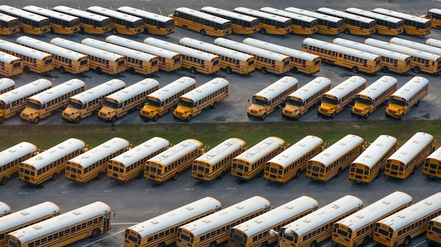 Photo aerial view of yellow school buses deposit