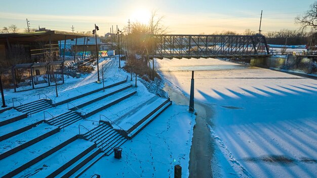 Aerial Winter Glow on Snowy Amphitheater and Frozen River Fort Wayne