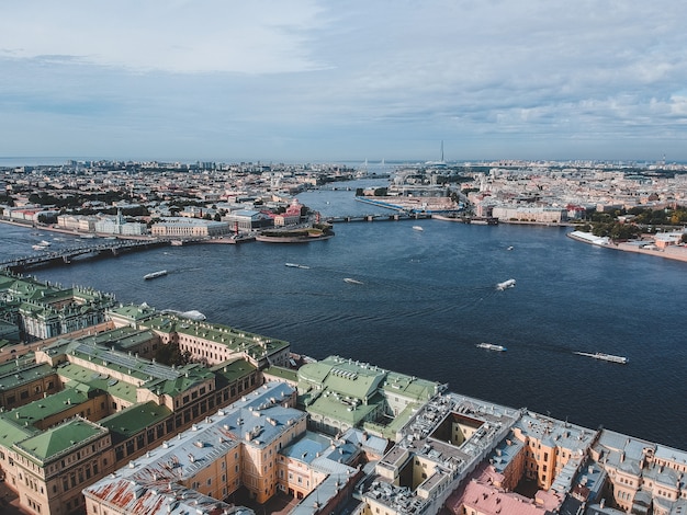 Aerialphoto Neva river, city center, old houses, river boats. St. Petersburg, Russia.