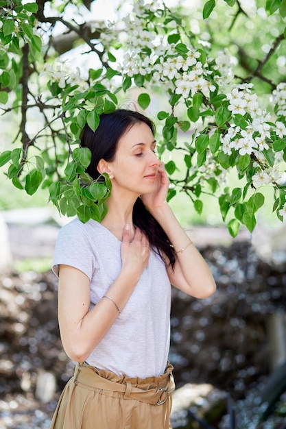 Aesthetic girl practicing spiritual breathwork meditation\
outside connecting with nature breathing work mental health concept\
wellness lifestyle