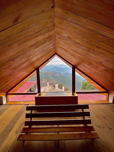 Aesthetic wooden attic with a mountain view in nainital uttarakhand India