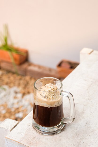 Affogato coffee with ice cream on a glass cup