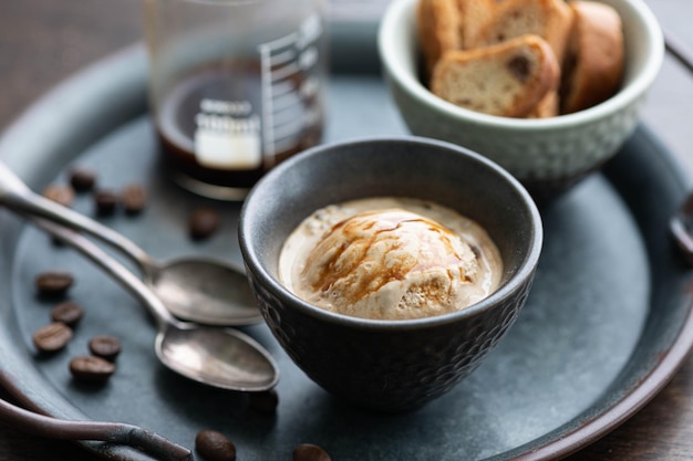 Photo affogato traditional italian dessert ice cream and coffee selective focus