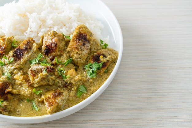 Afghani chicken in green curry or Hariyali tikka chicken hara masala with rice