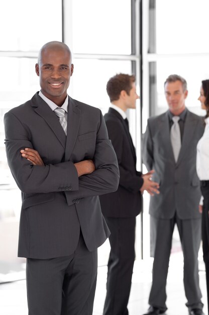 african-america Businessman in Front of Team