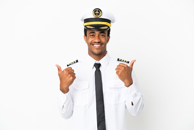 African American Airplane pilot over isolated white background with thumbs up gesture and smiling