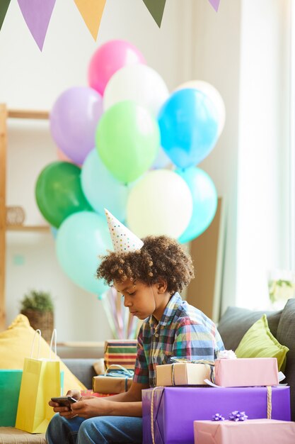 African-American Boy Opening Gifts