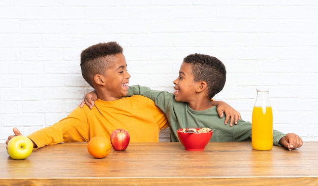 African American brothers having breakfast