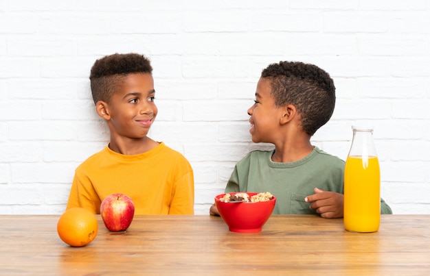 African American brothers having breakfast