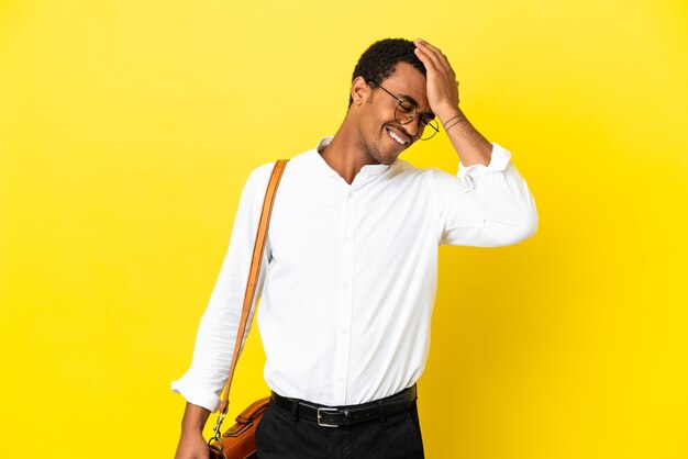 African American business man over isolated yellow background has realized something and intending the solution