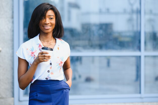 african american business woman at her office building