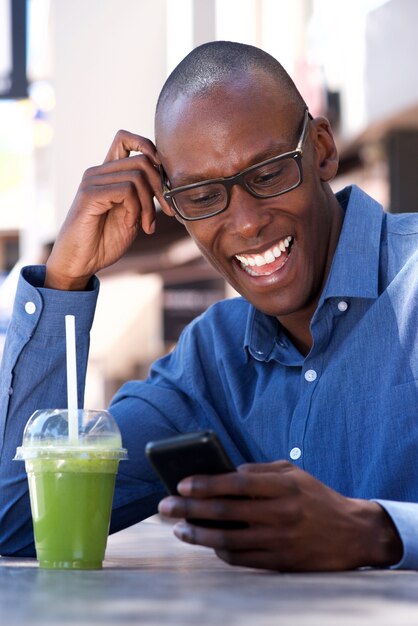 African american businessman using mobile phone