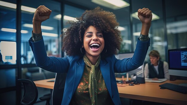 African american businesswoman excited on the workplace celebrating the successful deal