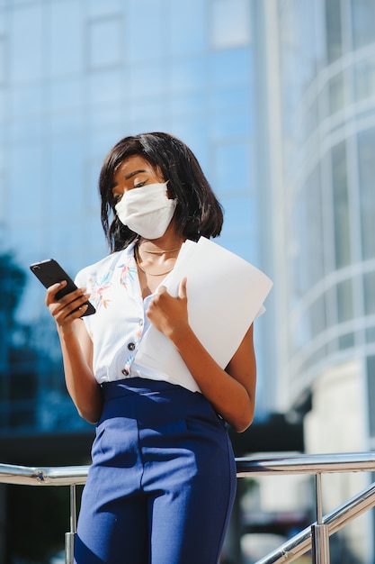 African American businesswoman using mobile phone