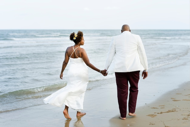 african american couple getting married at an island