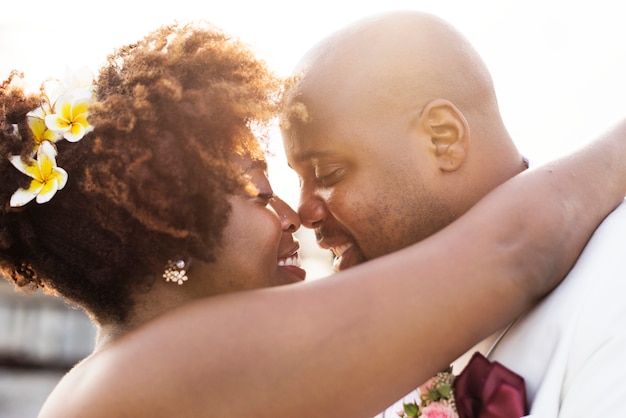 African American couple getting married at an island