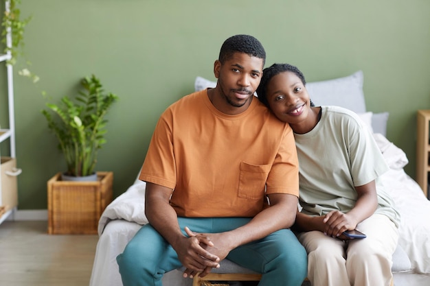 African american couple sitting at home