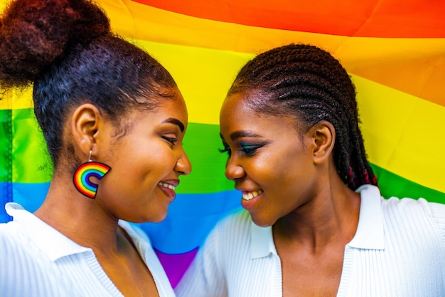 African american couple of two young beautyful women in summer park