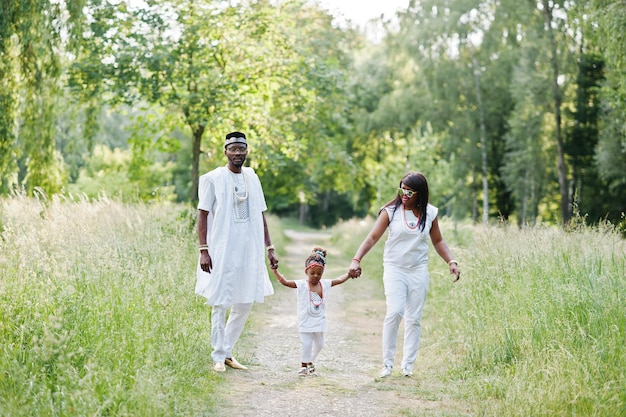 African american family at white nigerian national dress having fun outdoor