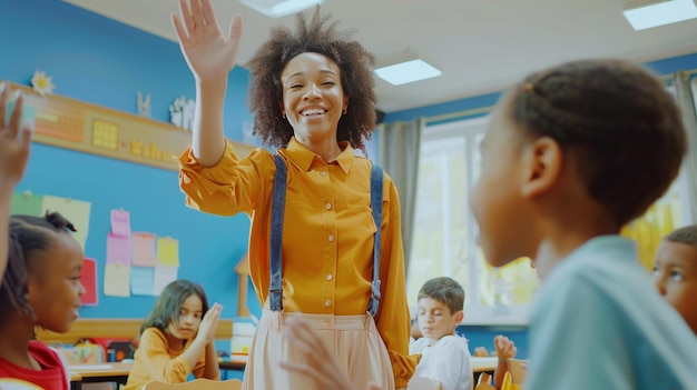 african american girl raising hands to teacher in classroom during class