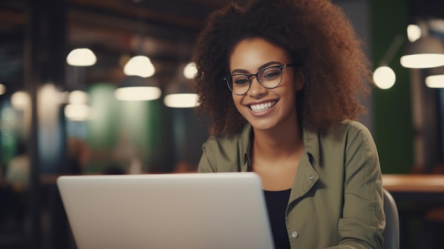 African american girl at restaurant with laptop