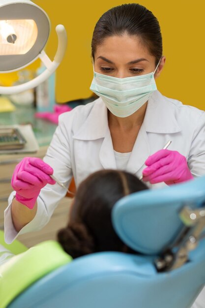 African American girl sitting on a medical examination