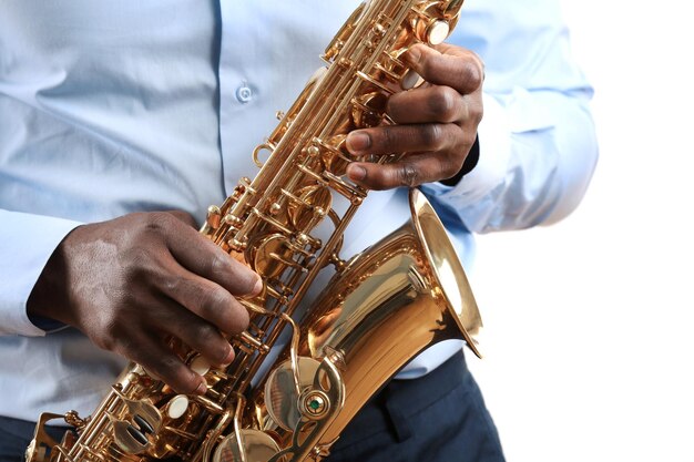 African American jazz musician playing the saxophone closeup