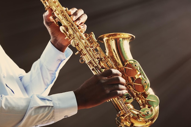 African American jazz musician playing the saxophone closeup